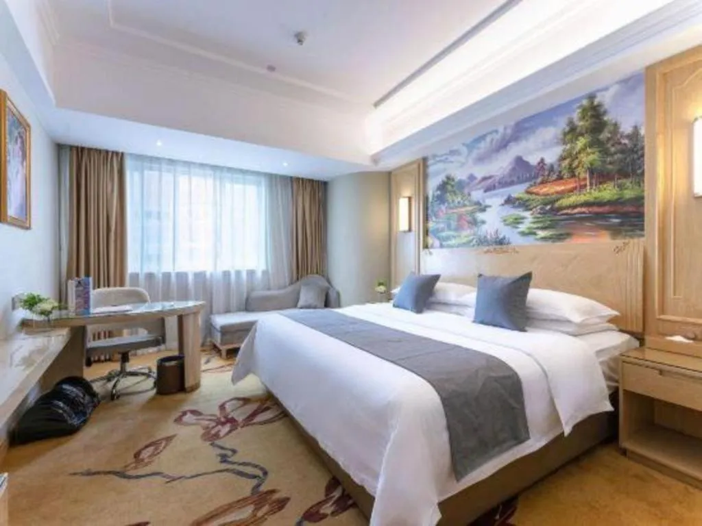 Bed in Vienna Hotel Chongqing Jiefangbei Hongyadong