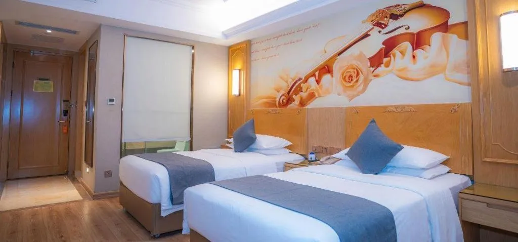 Bed in Vienna Hotel Chongqing Jiefangbei Hongyadong