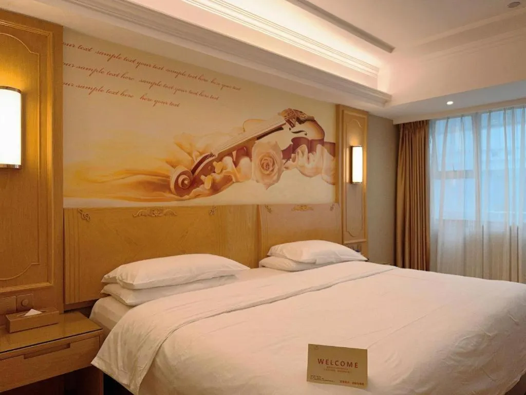 Bed in Vienna Hotel Chongqing Jiefangbei Hongyadong