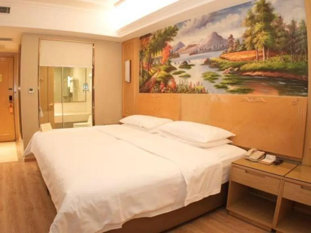 Bed in Vienna Hotel Chongqing Jiefangbei Hongyadong