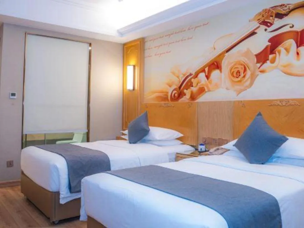 Bed in Vienna Hotel Chongqing Jiefangbei Hongyadong