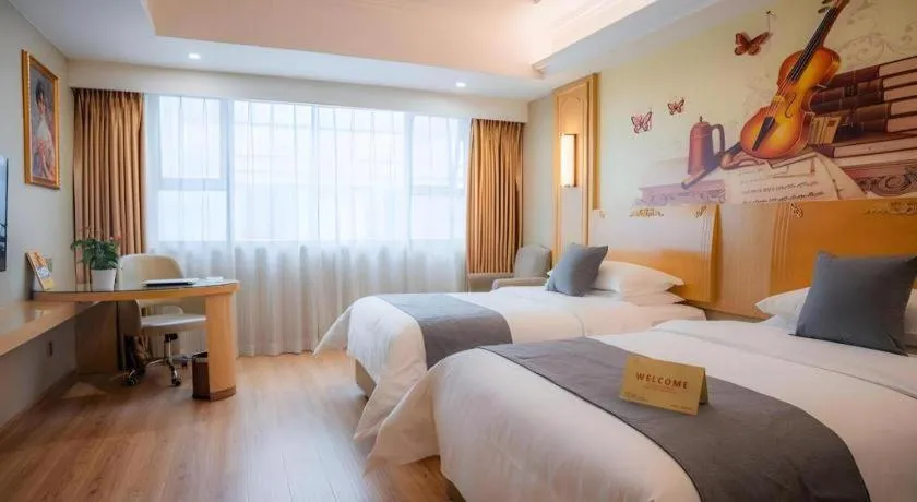 Bed in Vienna Hotel Chongqing Jiefangbei Hongyadong