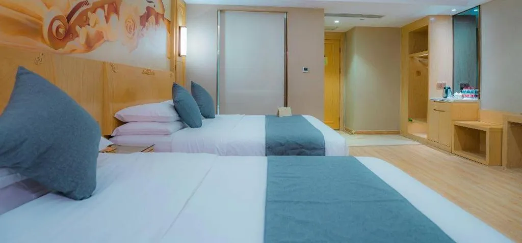 Bed in Vienna Hotel Chongqing Jiefangbei Hongyadong