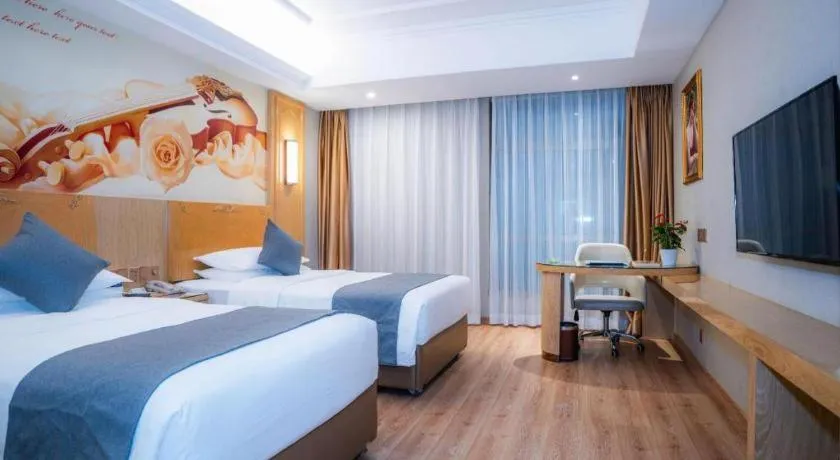 Bed in Vienna Hotel Chongqing Jiefangbei Hongyadong