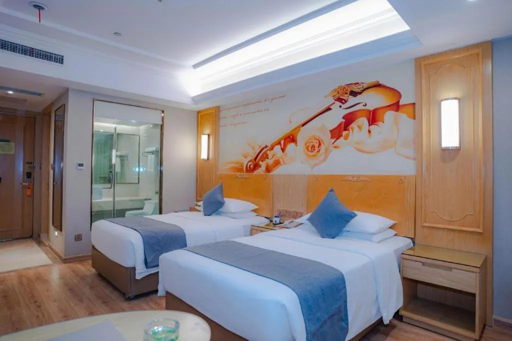 Bed in Vienna Hotel Chongqing Jiefangbei Hongyadong