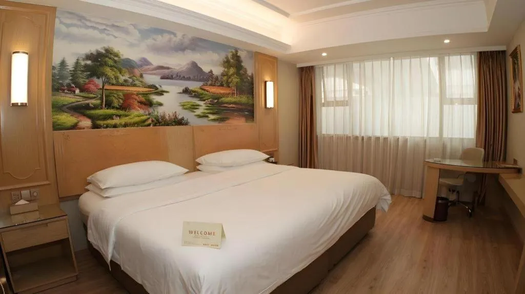 Bed in Vienna Hotel Chongqing Jiefangbei Hongyadong