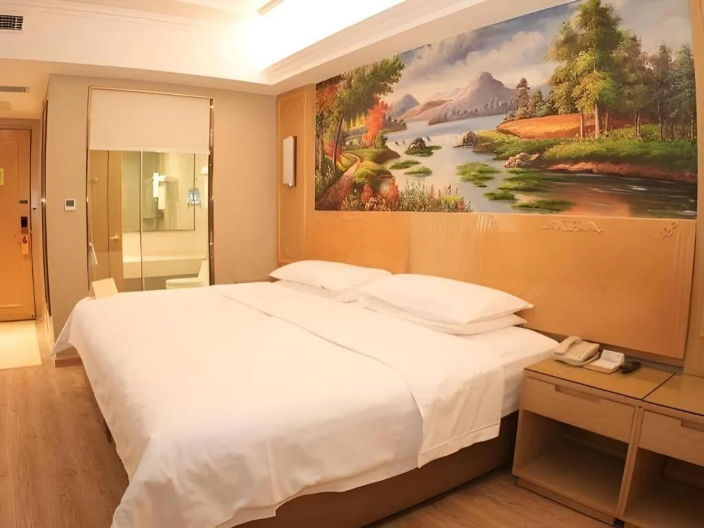 Bed in Vienna Hotel Chongqing Jiefangbei Hongyadong