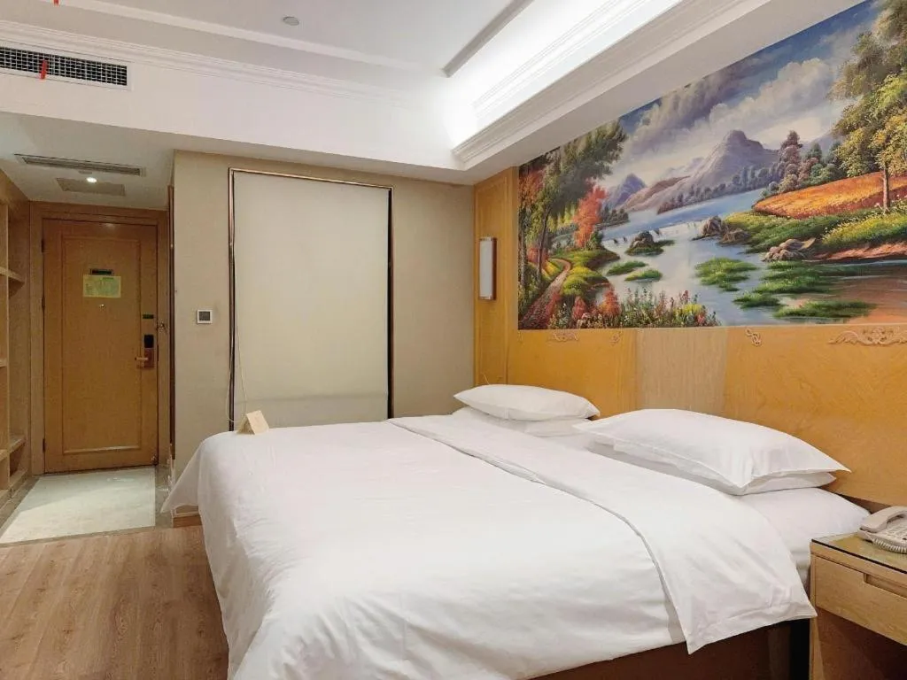 Bed in Vienna Hotel Chongqing Jiefangbei Hongyadong