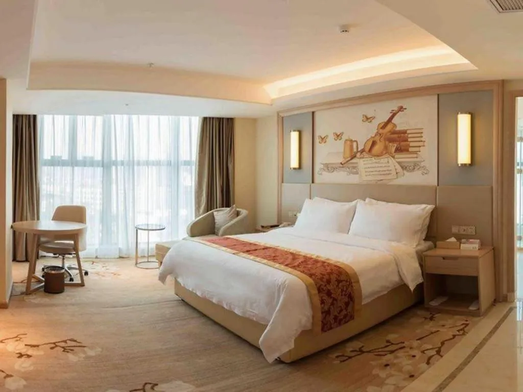 Bed in Venus International Hotel Guangdong Meizhou Fengshun Huamao Hot-Spring