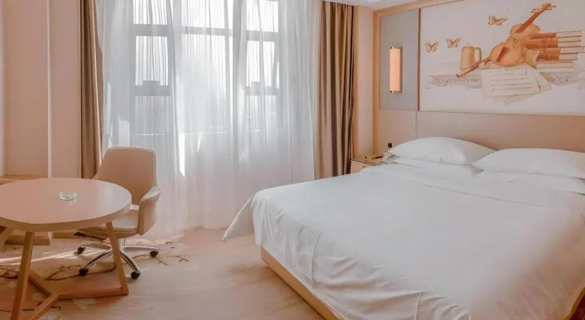 Bed in Venus International Hotel Guangdong Meizhou Fengshun Huamao Hot-Spring