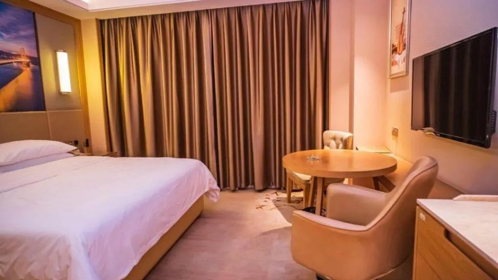 Bed in Venus International Hotel Guangdong Meizhou Fengshun Huamao Hot-Spring