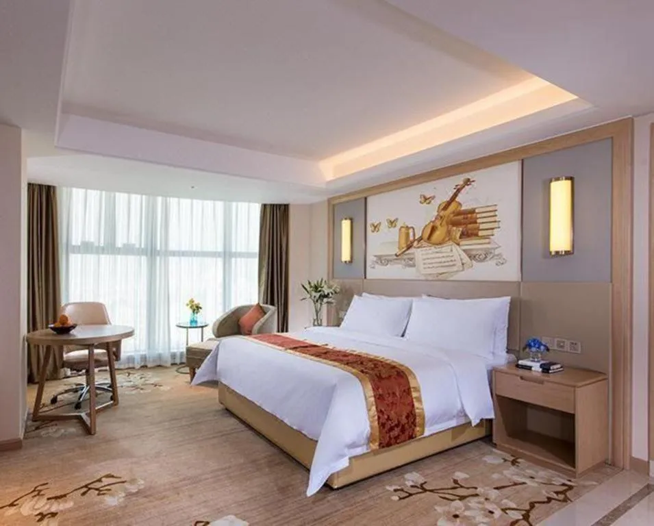Bed in Venus International Hotel Guangdong Meizhou Fengshun Huamao Hot-Spring