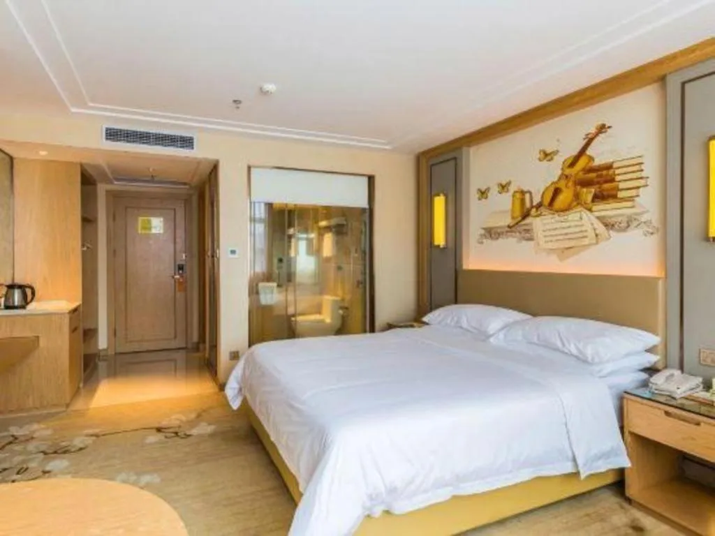 Bed in Venus International Hotel Guangdong Meizhou Fengshun Huamao Hot-Spring
