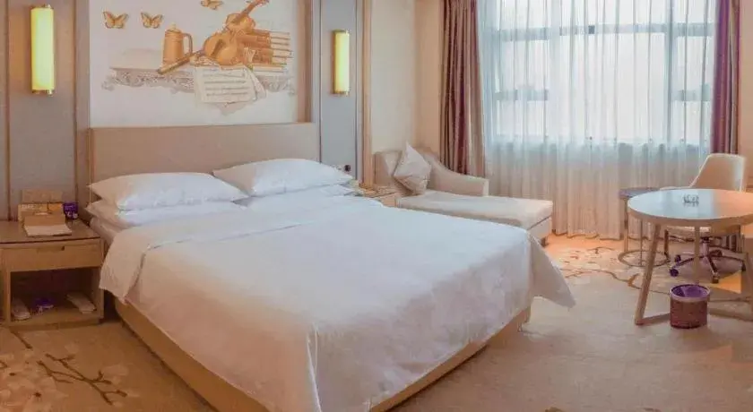 Bed in Venus International Hotel Guangdong Meizhou Fengshun Huamao Hot-Spring Bed in Venus International Hotel Guangdong Meizhou Fengshun Huamao Hot-Spring