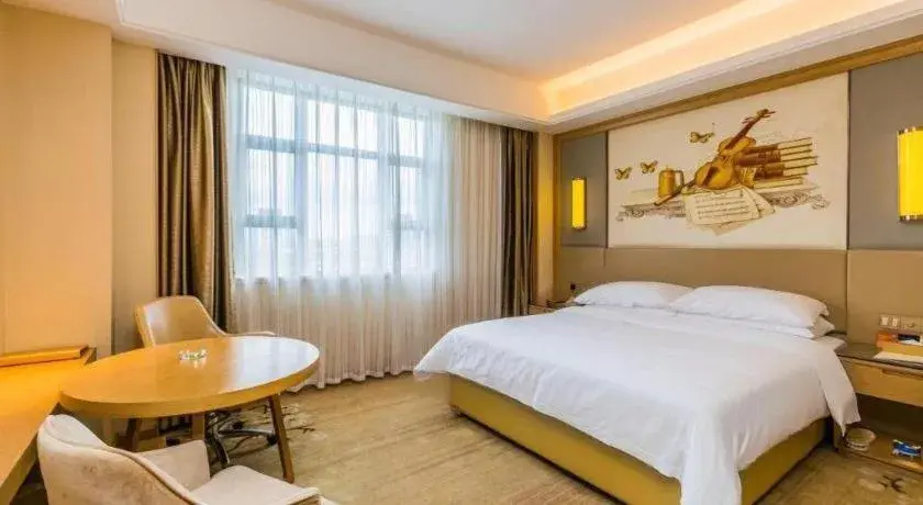 Bed in Venus International Hotel Guangdong Meizhou Fengshun Huamao Hot-Spring Bed in Venus International Hotel Guangdong Meizhou Fengshun Huamao Hot-Spring