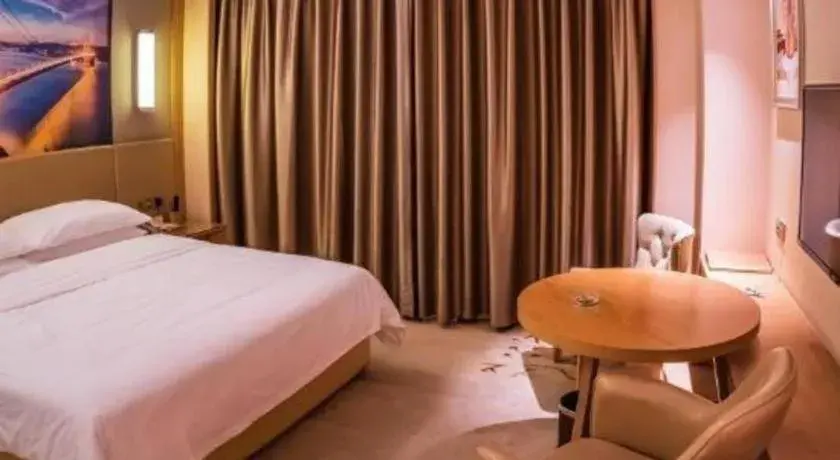 Bed in Venus International Hotel Guangdong Meizhou Fengshun Huamao Hot-Spring Bed in Venus International Hotel Guangdong Meizhou Fengshun Huamao Hot-Spring