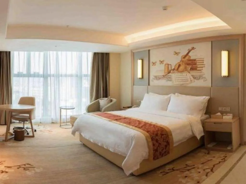 Bed in Venus International Hotel Guangdong Meizhou Fengshun Huamao Hot-Spring