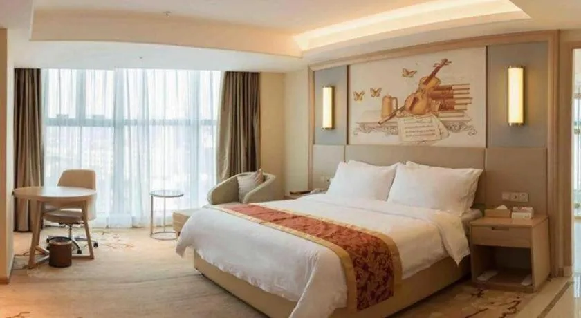 Bed in Venus International Hotel Guangdong Meizhou Fengshun Huamao Hot-Spring