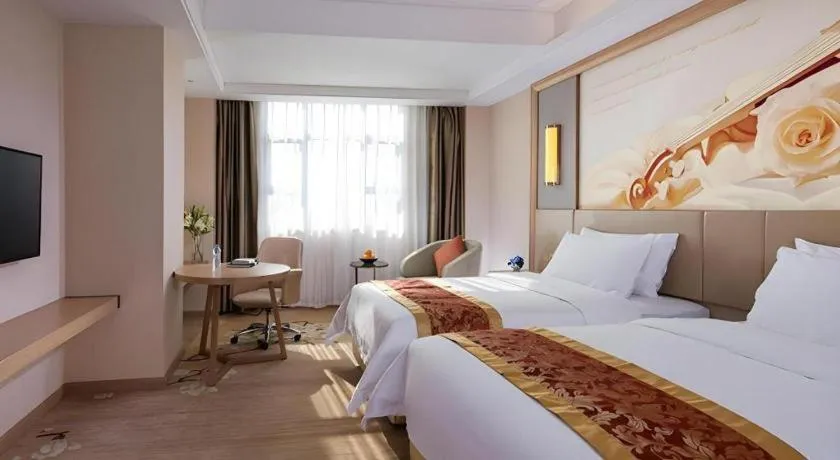 Bed in Venus International Hotel Guangdong Meizhou Fengshun Huamao Hot-Spring