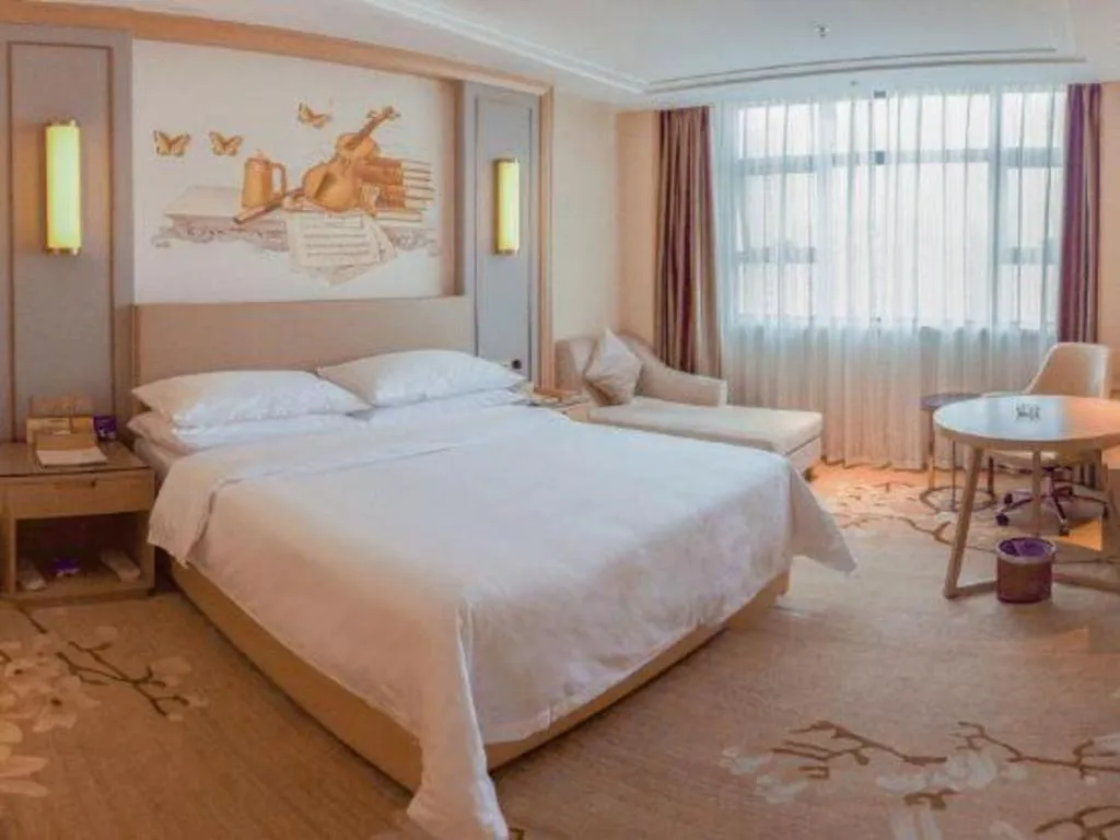 Bed in Venus International Hotel Guangdong Meizhou Fengshun Huamao Hot-Spring