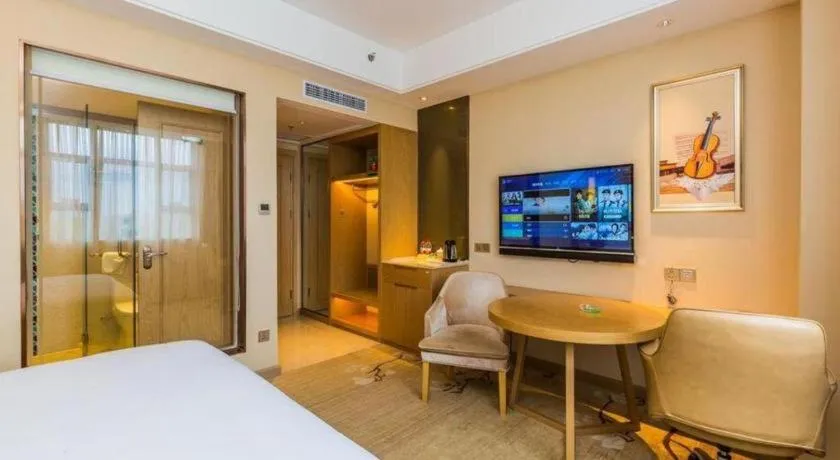 Bed in Venus International Hotel Guangdong Meizhou Fengshun Huamao Hot-Spring