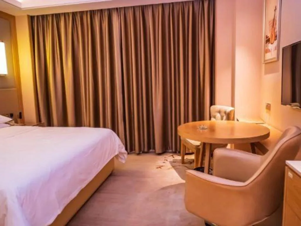 Bed in Venus International Hotel Guangdong Meizhou Fengshun Huamao Hot-Spring