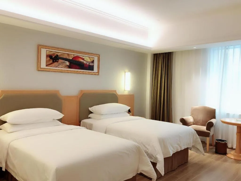 Bed in Vienna Hotel Guangdong Foshan Wenhua North Road