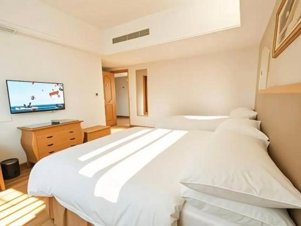 Bed in Vienna Hotel Guangdong Foshan Wenhua North Road