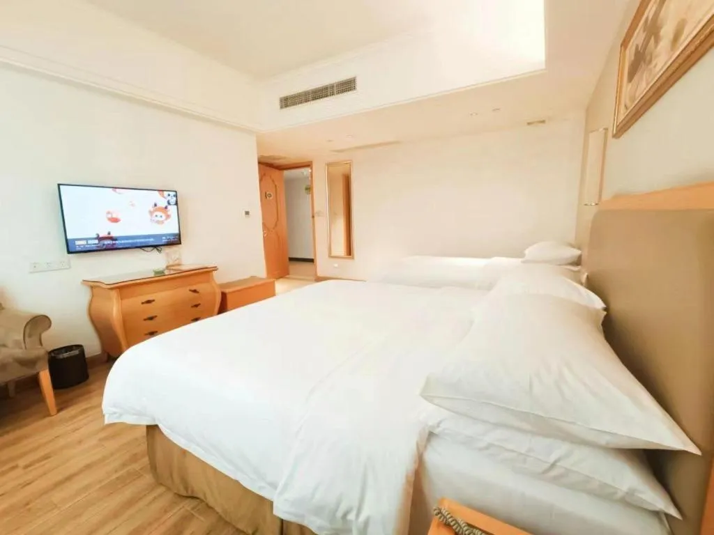 Bed in Vienna Hotel Guangdong Foshan Wenhua North Road