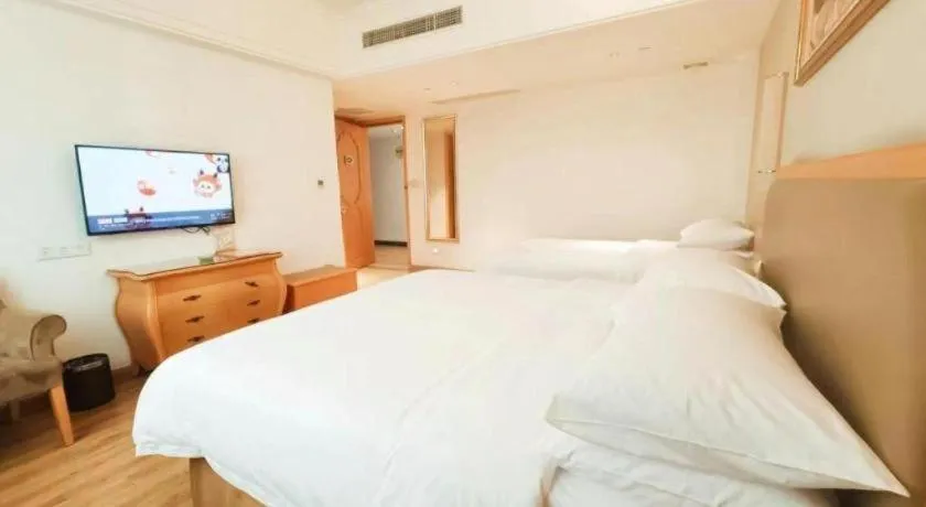 Bed in Vienna Hotel Guangdong Foshan Wenhua North Road