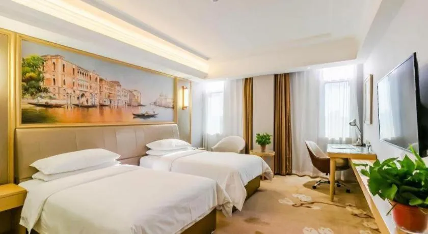 Bed in Vienna Hotel Shandong Qingdao Jiaodong International Airport Hai'er Avenue