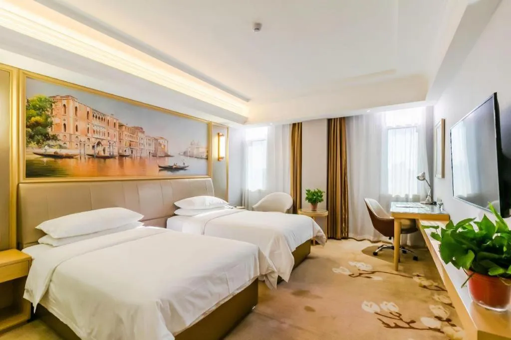 Bed in Vienna Hotel Shandong Qingdao Jiaodong International Airport Hai'er Avenue