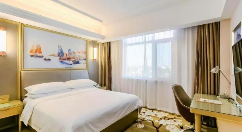 Bed in Vienna Hotel Shandong Qingdao Jiaodong International Airport Hai'er Avenue