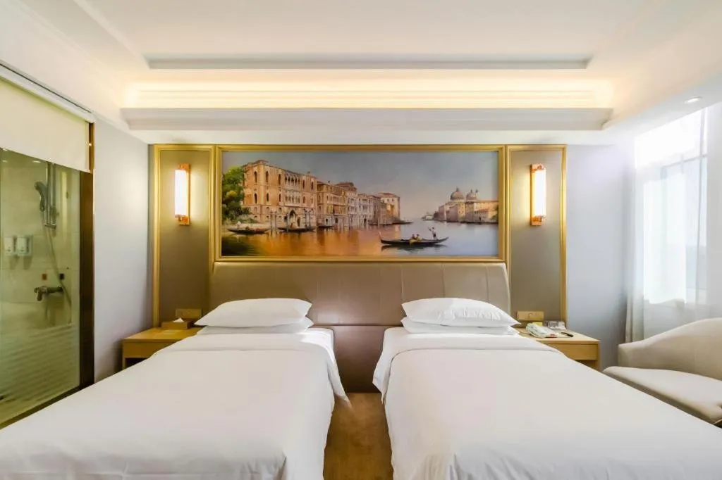 Bed in Vienna Hotel Shandong Qingdao Jiaodong International Airport Hai'er Avenue