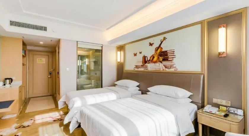 Bed in Vienna Hotel Shandong Qingdao Jiaodong International Airport Hai'er Avenue