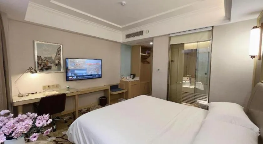 Bed in Vienna Hotel Shandong Qingdao Jiaodong International Airport Hai'er Avenue