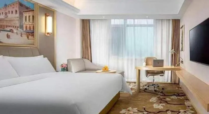 Bed in Vienna Hotel Shandong Qingdao Jiaodong International Airport Hai'er Avenue