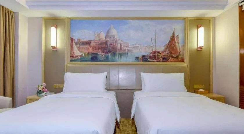 Bed in Vienna Hotel Shandong Qingdao Jiaodong International Airport Hai'er Avenue