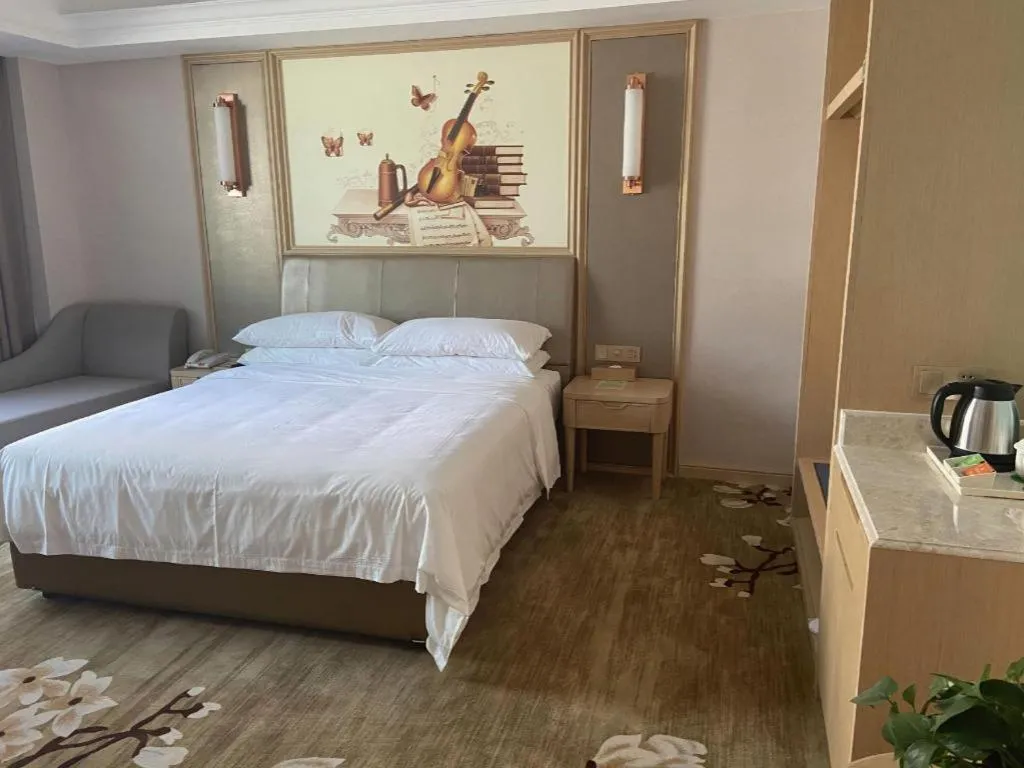 Bed in Vienna Hotel Shandong Qingdao Jiaodong International Airport Hai'er Avenue