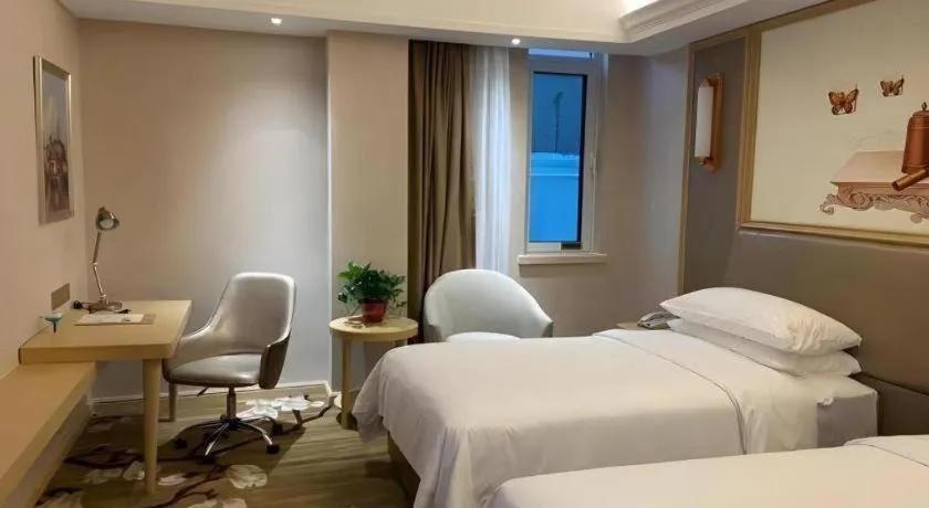 Bed in Vienna Hotel Shandong Qingdao Jiaodong International Airport Hai'er Avenue