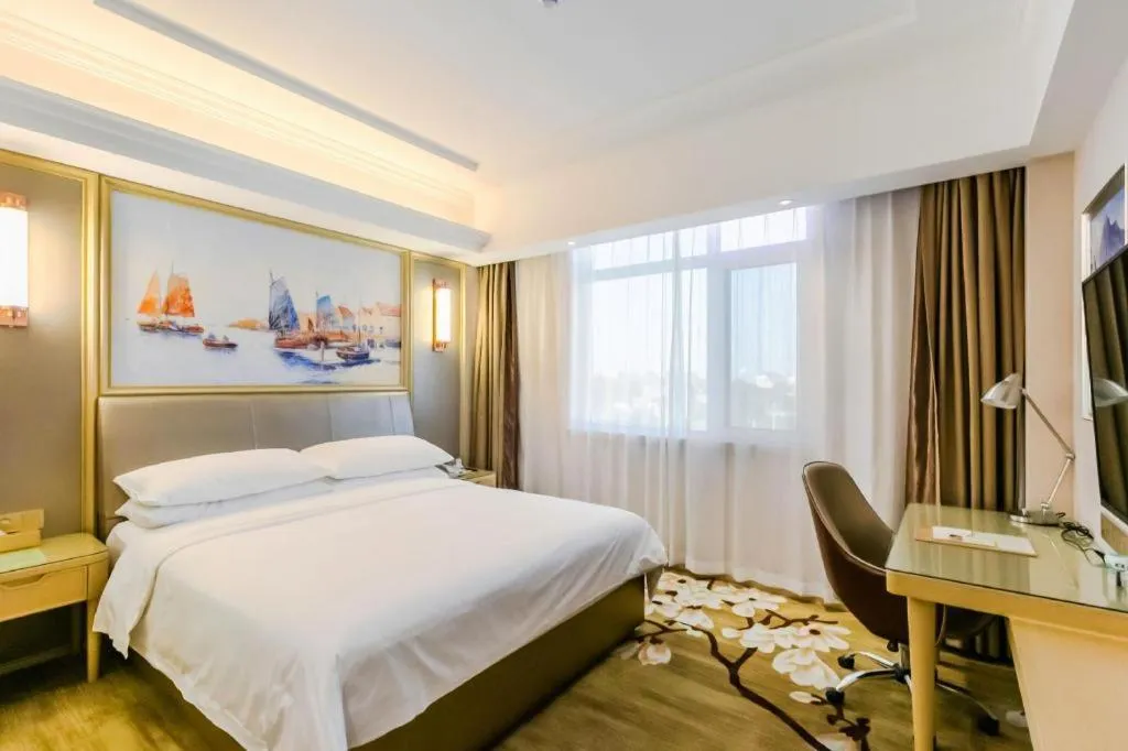 Bed in Vienna Hotel Shandong Qingdao Jiaodong International Airport Hai'er Avenue