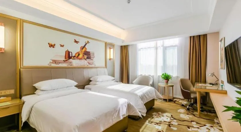 Bed in Vienna Hotel Shandong Qingdao Jiaodong International Airport Hai'er Avenue