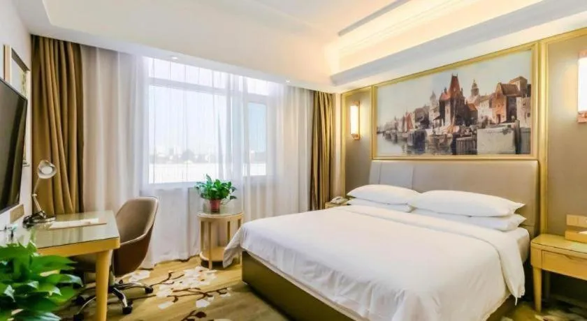 Bed in Vienna Hotel Shandong Qingdao Jiaodong International Airport Hai'er Avenue
