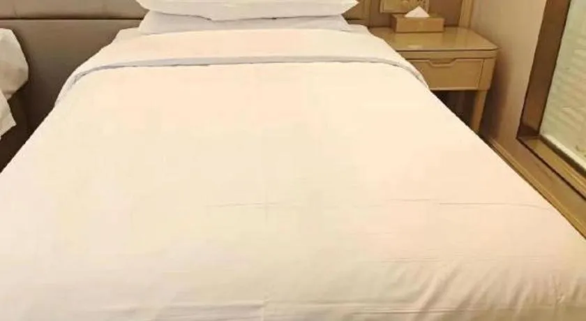 Bed in Vienna Hotel Shandong Qingdao Jiaodong International Airport Hai'er Avenue