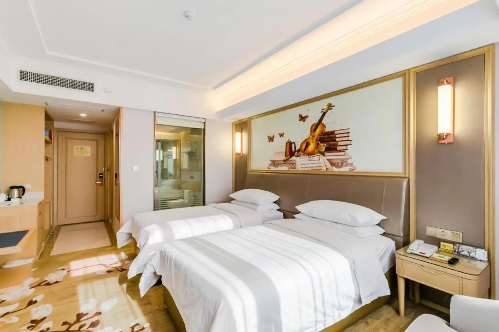 Bed in Vienna Hotel Shandong Qingdao Jiaodong International Airport Hai'er Avenue