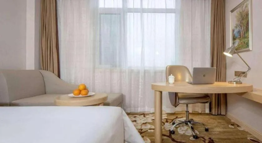 Bed in Vienna Hotel Shandong Qingdao Jiaodong International Airport Hai'er Avenue