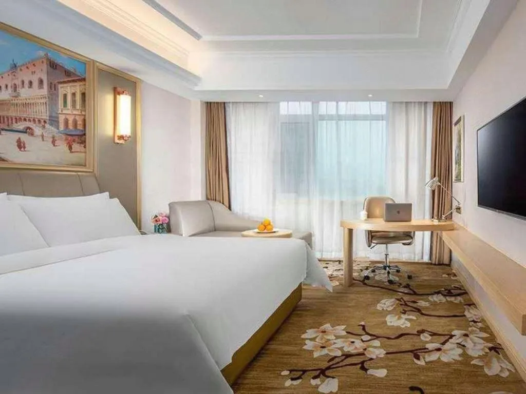 Bed in Vienna Hotel Shandong Qingdao Jiaodong International Airport Hai'er Avenue