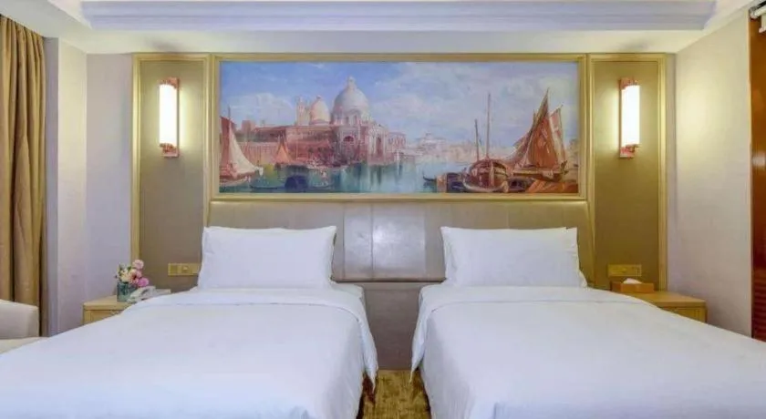 Bed in Vienna Hotel Shandong Qingdao Jiaodong International Airport Hai'er Avenue