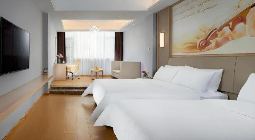 Bed in Vienna Hotel Zhengzhou Fengchan Road Fortune Plaza
