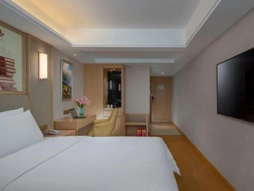 Bed in Vienna Hotel Zhengzhou Fengchan Road Fortune Plaza
